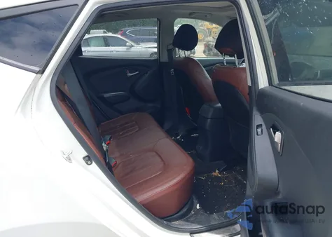 2010 Hyundai Tucson Limited z USA, uszkodzony, nr VIN KM8JUCAC5AU051857